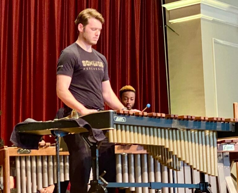 Logan Gordy playing xylophone with Schwob Percussion Ensemble